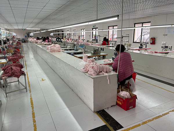 1694049099227964.jpg 山東金X盛服飾有限公司